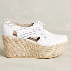 KMB Cutout Platform Oxfords, which feature a white leather upper
